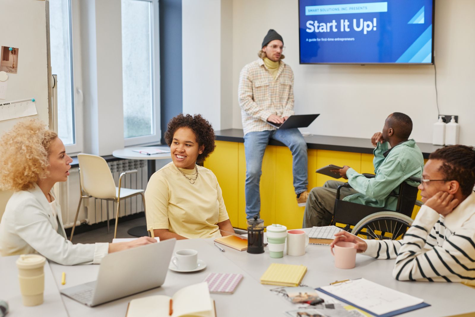 A diverse team exchanging ideas during a collaborative session